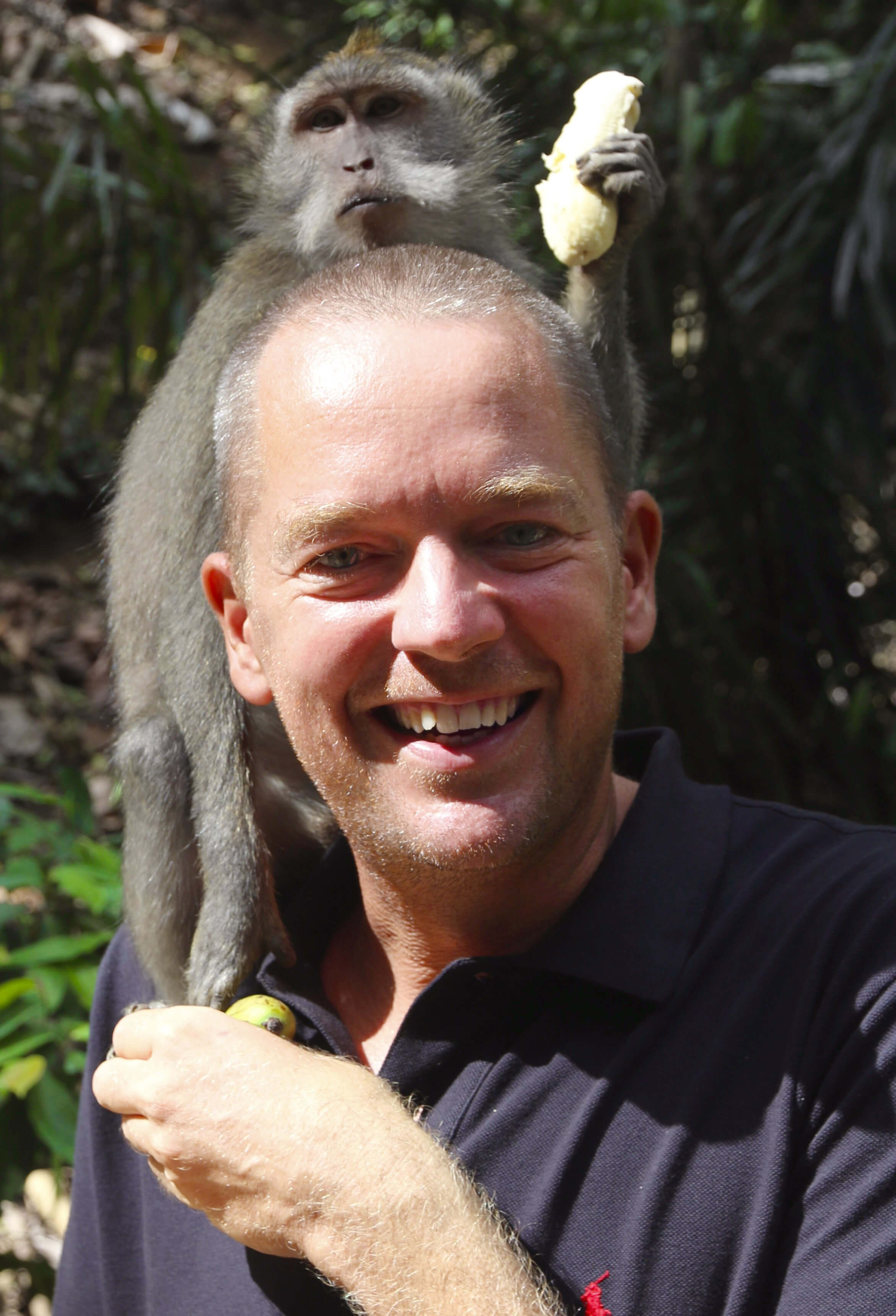 Fritze von Berswordt taking controlled risks with a monkey in Indonesia